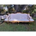 A 20th Century French Style Gilt Wood Large Conversation Settee