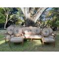 A 20th Century French Louis XVI Style Set of a Carved and Gilded Settee and Four Armchairs with T...