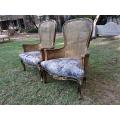 A 20th Century Pair of French Style Gilt Wood Rattan Arm Chairs