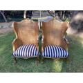 A Pair of 20th Century French Style Gilt Wood Arm Chairs with Rattan Back