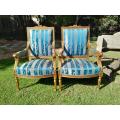 A 20th Century French Style Pair of Gilt Wood Arm Chairs