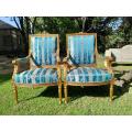 A 20th Century French Style Pair of Gilt Wood Arm Chairs