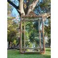 A French Rococo Style Large Ornately Carved & Gilded Bevelled Mirror