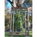A French Rococo Style Ornately Carved & Gilded Large Bevelled Mirror