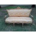 A 20th Century Circa 1950 French Style Ornately Carved Giltwood Settee