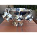 A Silverplate Punch Bowl With Twelve Cups