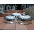 A Set of Three Late Victorian Graduated Silver-plated Food Domes.