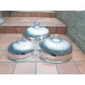 A Set of Three Late Victorian Graduated Silver-plated Food Domes.