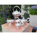 A Late 19th Century Silver-plated & Bone Tea Set With a Tilt Kettle on a Warmer/burner Stand