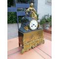 An Mid-19th Century French Gilt Bronze Clock Complete With Pendulum And Key, Circa 1850s
