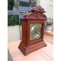 An Antique Oak French Mantel Clock