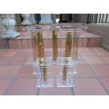 A Mid-20th Century Circa 1945 Set of Seven WW2 Brass Cannon Shells In Perspex Boxes