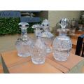 A Set of Four Heavy Cut Crystal Decanters
