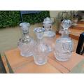 A Set of Four Heavy Cut Crystal Decanters