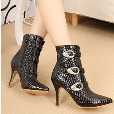 pointed snakeskin booties