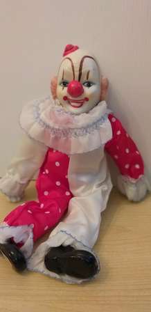 small porcelain clown dolls