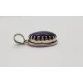 Sterling Silver vintage pendant with purple stone as per photo