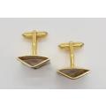 Pair of gold coloured cufflinks - as per photo