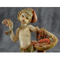 FIGURINE FISHER BOY SELLING HIS FISH - VINTAGE - from SUEZYT