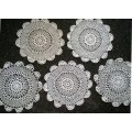 Five white cotton crochet doilies 23cm