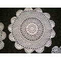 Five white cotton crochet doilies 23cm