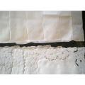 Embroidered white cotton table set