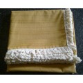 Large gold tablecloth with tassel trim