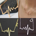Gold Heart Beat Pendant Necklace