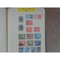 OLD Stamp Album  with over 850 Mint/Used BRITISH Commonwealth Stamps