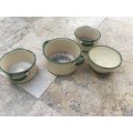 vintage judge cream and green enamel pots and one bowl