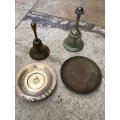 vintage pair of brass bells with small plates