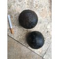 vintage pair of full metal cannon balls ball