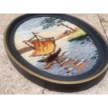 vintage needlepoint in oval frame subject sailing boat