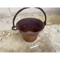 vintage hammered copper cauldron planter with wrought iron handle