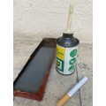 Vintage oil can BP with old sharpening stone