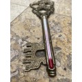 Vintage brass key thermometer in key box