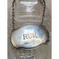 Lead crystal decanter pair with Sterling silver labels vodka and rum