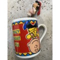 Vintage peanuts cartoon coffee mug with pvc Lucy necklace toy