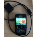 VINTAGE BlackBerry 8520 Cell phone with charger, a usb cable and ear phones