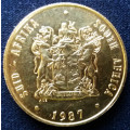 1987 SA gold in colour R1 non circulated Coat of Arms Coin