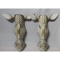 two wood carvings of ZEBRA WALL ART
