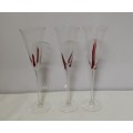 three flute GLASSES / bid per glass