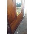 ANTIQUE WARDROBE  WITH  LARGE DRAWER AND BEVELLED MIRROR   / BUYER MUST COLLECT IN EDENVALE JHB