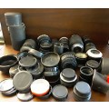 A Job lot of Camera Lenses , covers and parts sold as is