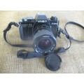 Popular Vintage Minolta X-300s SLR Camera With Film And Attached Minolta MD Zoom 28 - 70 mm Lens
