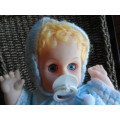 Lovely small doll.  seems to do something with dummy activating it.  untested