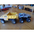 BUDDY L PRESSED METAL TIP TRUCK AND PLASTIC MONSTER TRUCK