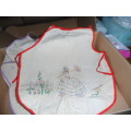 Lovely kiddies embroidered aprons half done 4