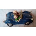 Vintage -Ceramic Car,- Money Box with Two Funny Guys, off on a Golf Trip.