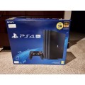 PS4 PRO 1TB EXCELLENT CONDITION INCLUDING 1 CONTROLLER THAT'S AND 2 NEW GAMES. PRICE NEGOTIABLE